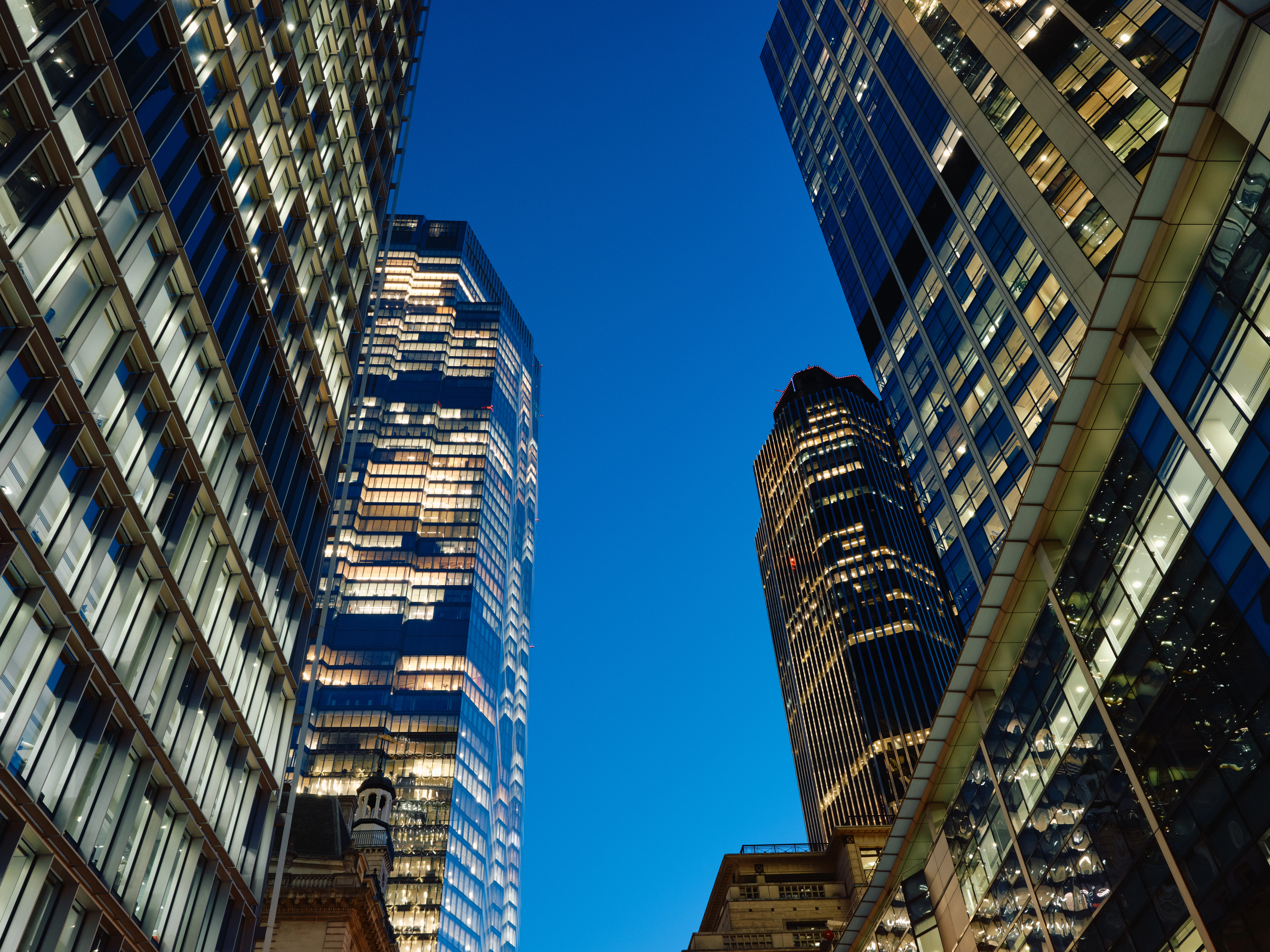 Low angle view of skyscrapers in London banking district - stock photo
