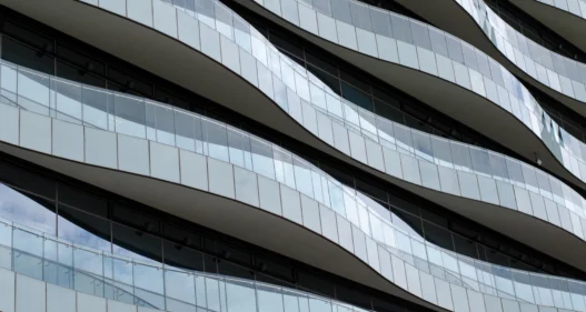 Waves facade design - Balconies like waves flow elegantly. - stock photo