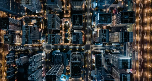 Top View of Cityscape and Skyscrapers at Night - stock photo