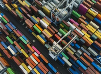 Aerial/drone view of colourful containers in the port cargo area - stock photo