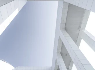 Abstract upward view of white architectural arch - stock photo